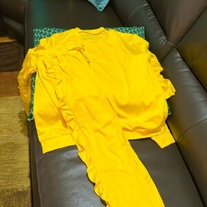 NWT yellow jogging set.